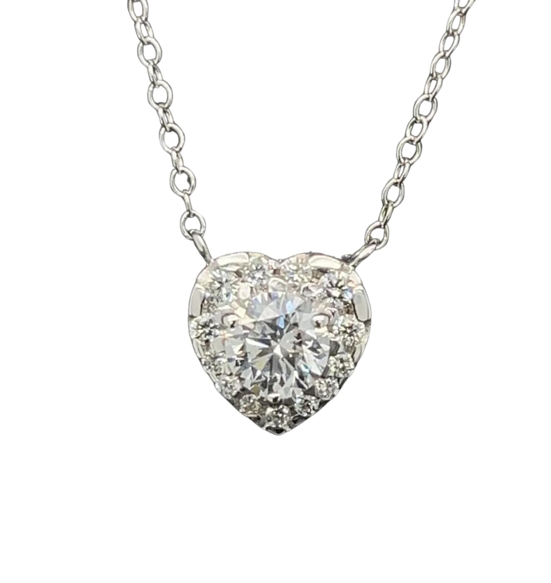 14kt white gold diamond heart Necklace set in halo with diamond by the yard chain